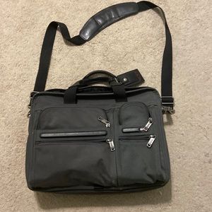 Grey Tumi computer bag